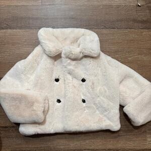 Cream faux fur coat